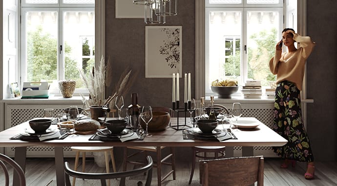 Een fotorealistische 3D-interieurrender van een sfeervolle eetkamer met een prachtig gedekte tafel en een vrouw die bij het raam telefoneert. De scène is rijk gevuld met hoogwaardige 3D-modellen en decoraties, afkomstig uit de geïntegreerde Chaos Cosmos asset bibliotheek.