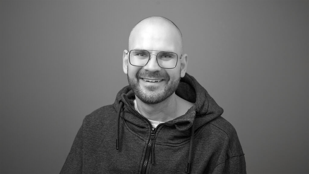 Portret van Edwin, supportspecialist bij Design8.