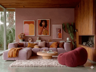 A Midjourney-generated, photorealistic render of a lushly furnished living room with pink walls, warm wood accents, and a plush pink sofa. This image showcases the impressive speed and quality of AI in creating interior concepts.
